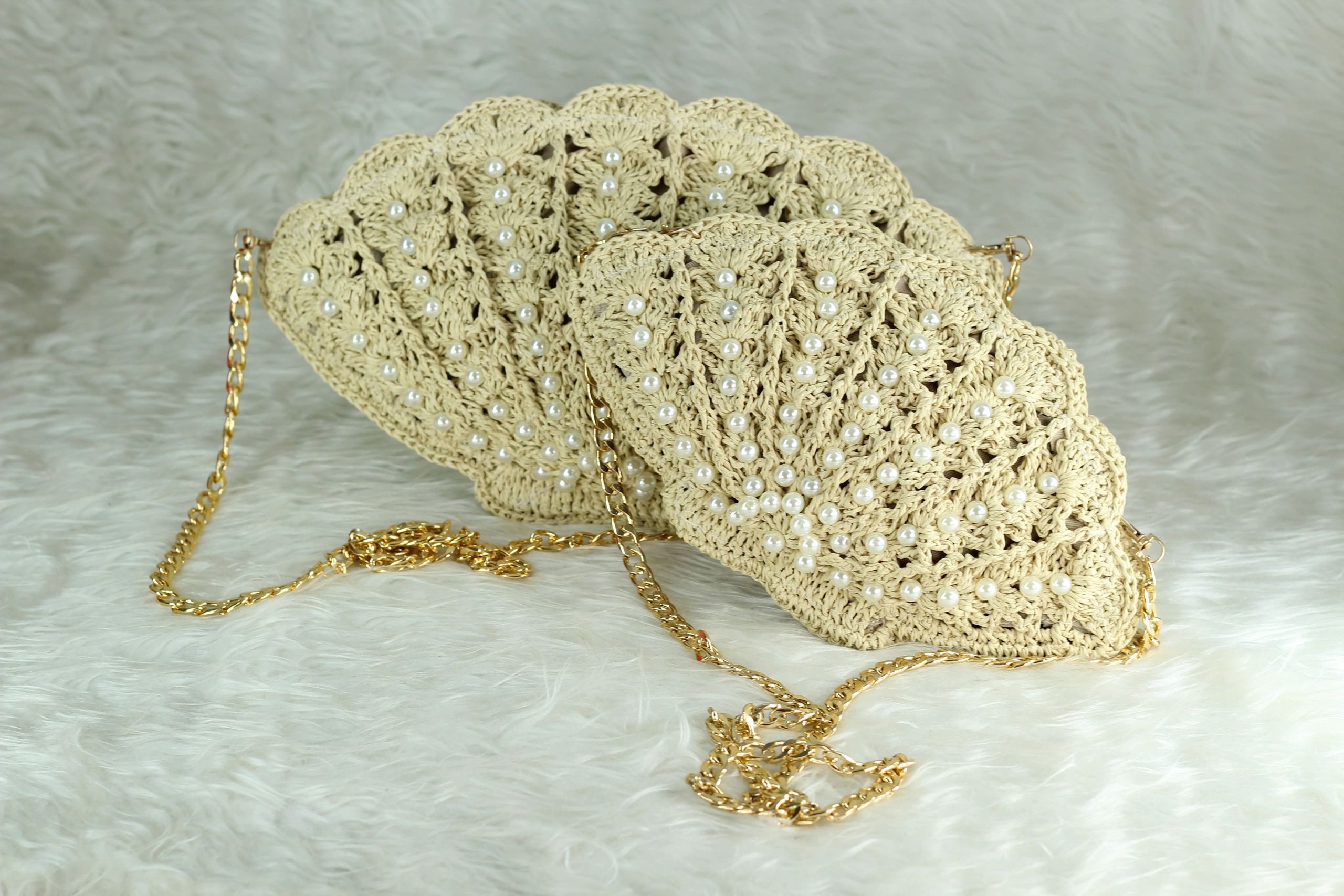 Beige crocheted shoulder bag with pearl details