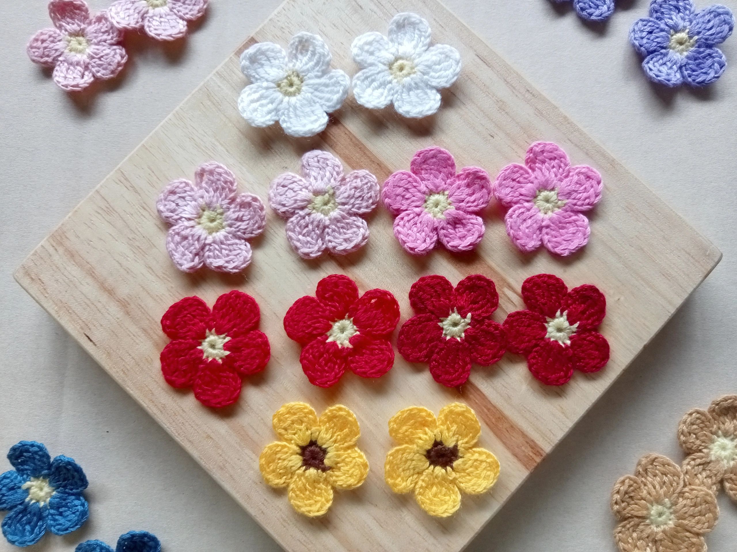 Crocheted flowers used as decorative handmade accessories